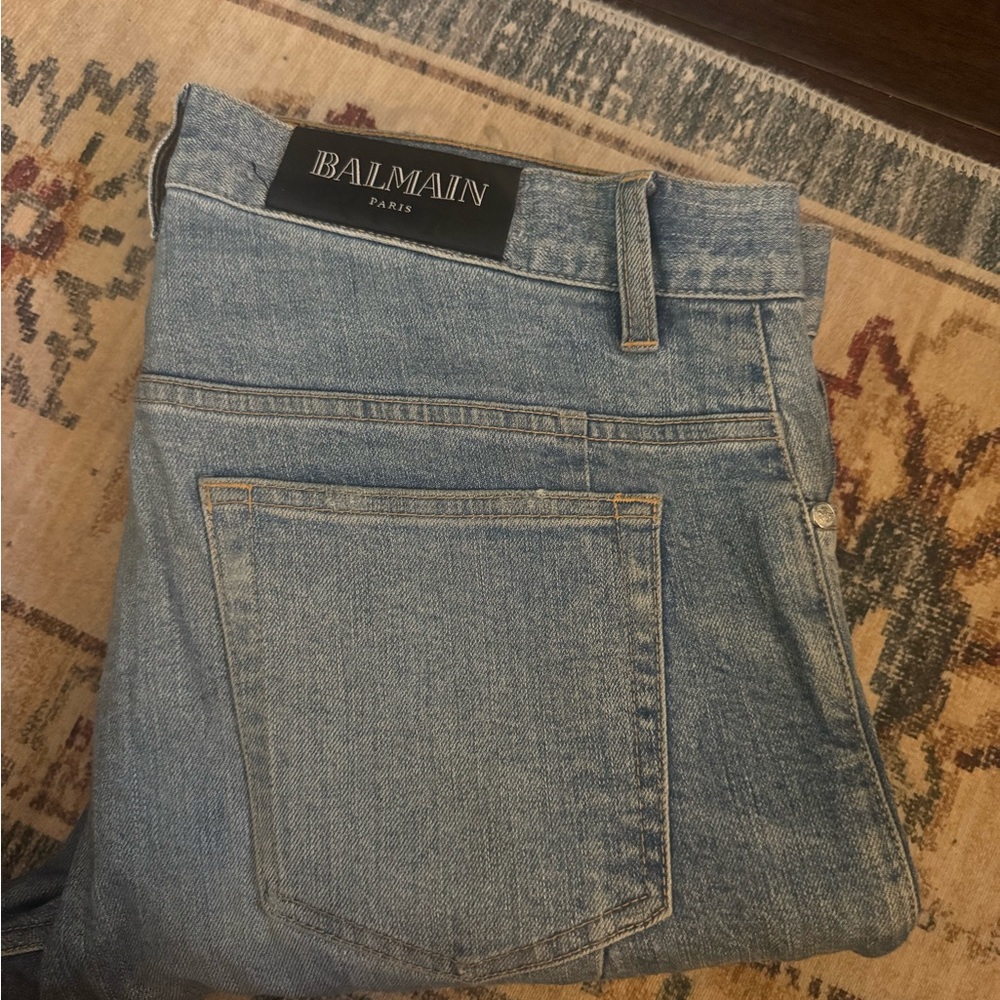 Balmain Light Blue Denim Jeans with patched knees